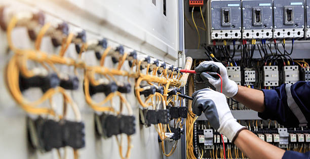 Professional Electrician technician working in Hornsby Bend, TX